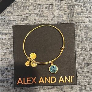 Alex and Ani Gold Bangle Bracelet with Blue Charm